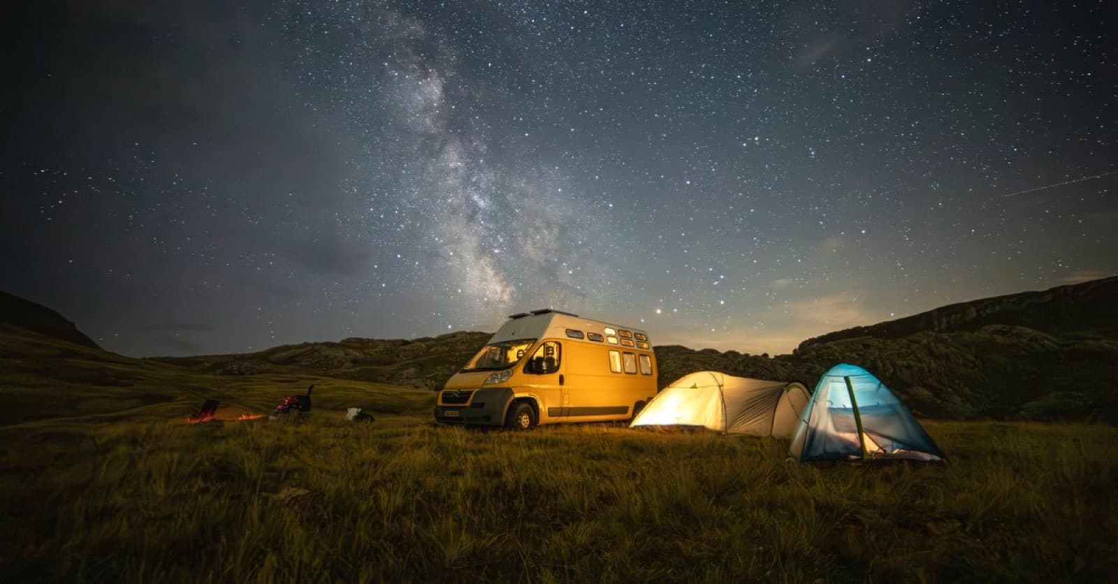 Camping under a starry night sky in New Zealand