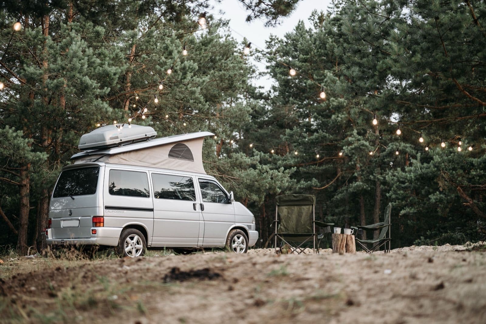 Campervan at a Department of Conservation campsite in New Zealand, the network that makes low-cost camping work