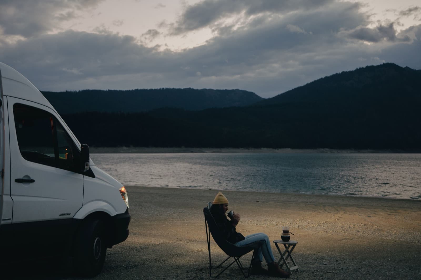 Campervan parked overnight beside a lake in New Zealand